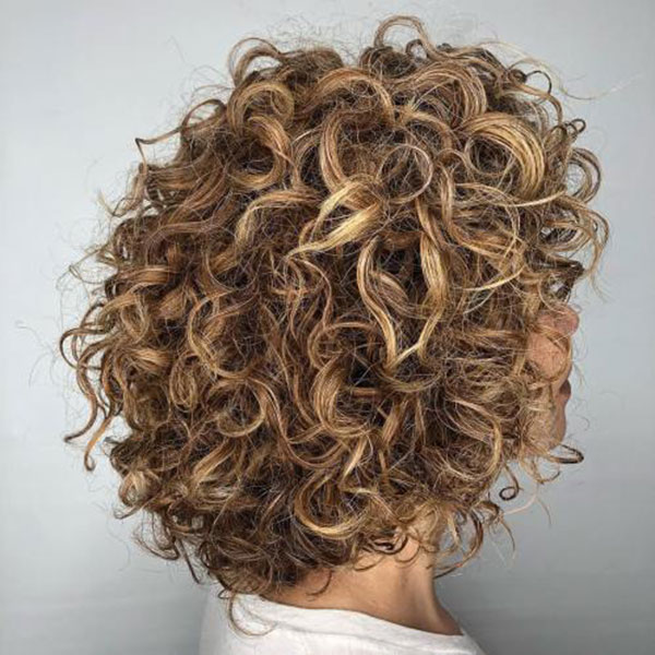Medium Tousled Curly Caramel Hairstyle